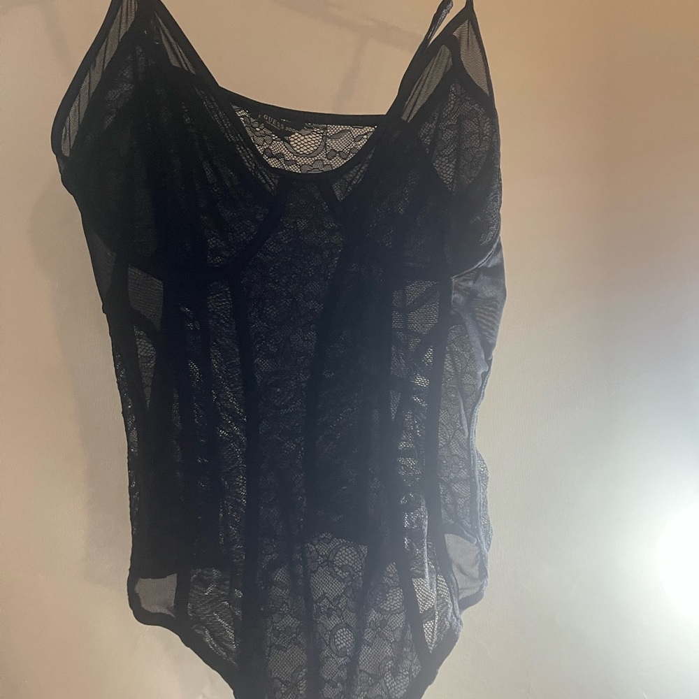 Guess lace bodysuit. Brand New. Tags are off. Never worn except to try on.